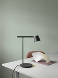 Muuto Tip Table Lamp - Modern Scandinavian design with minimalist aesthetic, soft light ideal for desks and nightstands.