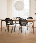 Trinidad chairs in black finish and ana dining table in oak finish by fredericia furniture