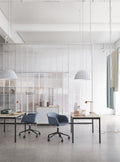 minimalist office space with lighting by muuto 