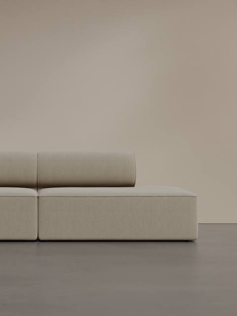 Minimalist beige Eave Modular Sofa with modular sections against neutral background