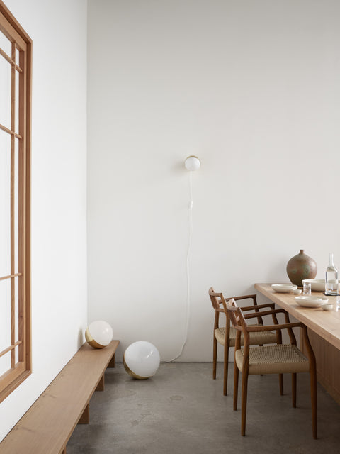 vl studio wall lamp designed by vilhelm lauritzen for louis poulsen in a mid century modern scandinavian kitchen 