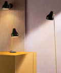 black vl38 floor lamp designed by vilhelm lauritzen for louis poulsen