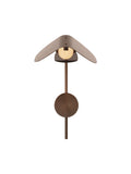 Bronzed aluminium Wing Wall Lamp lit, shade folded open over a mesh diffuser and glowing bulb