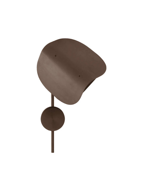 Bronzed aluminium Wing Wall Lamp seen from the side, shade curled forward above a round wall mount