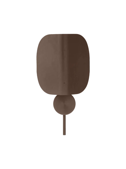 Audo Copenhagen Wing Wall Lamp in bronzed aluminium, curved shade flat against a round wall mount