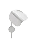 Polished aluminium Wing Wall Lamp seen from the side, shade curled forward above a round wall mount
