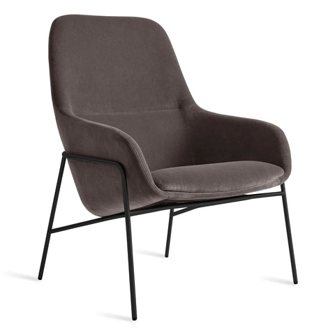Blu Dot Acre Lounge Chair in taupe grey velvet with black steel legs, three-quarter front view on white background