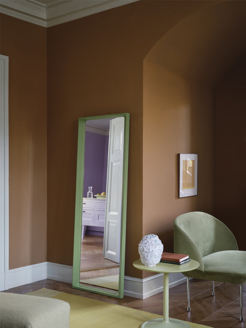 muuto arced mirror in light green lifestyle image 