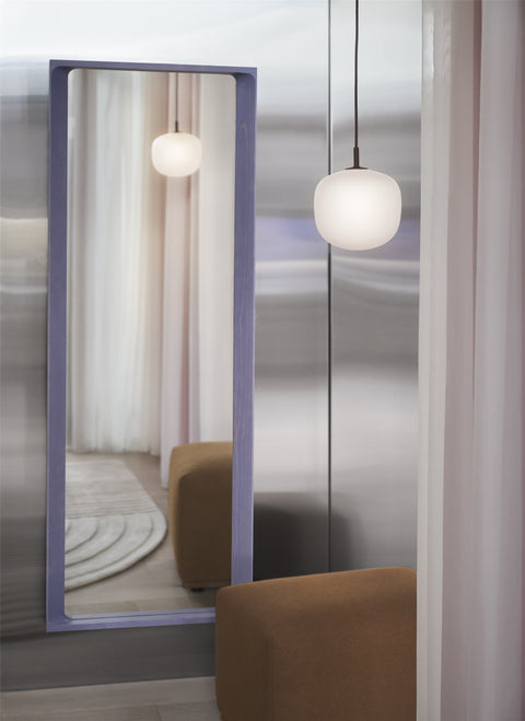 muuto lifestyle image of rime pendant light and light lilac mirror 