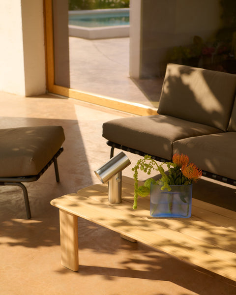 Assemble Coffee Table 135 in teak by Muuto styled with Beam Portable Lamp and Ridge Vase