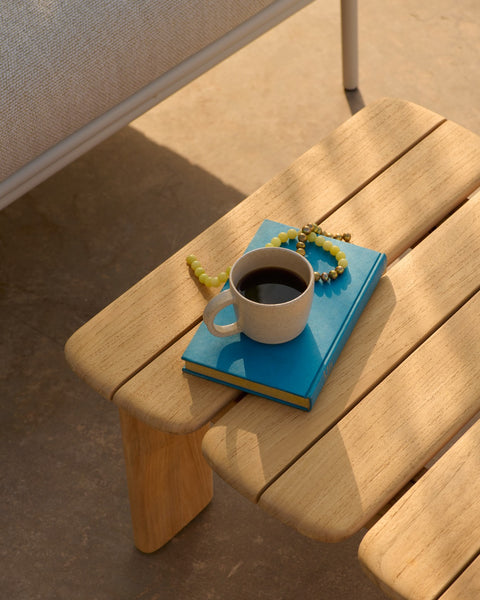 Assemble Coffee Table 55 cm in teak by Muuto styled with coffee cup and book