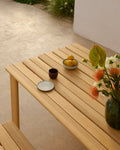 Close up of Muuto Assemble teak table with slatted top and outdoor styling