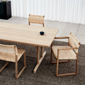 lifestyle image  of bm62 dining chair with danish caning designed by Borge mogensen for fredericia