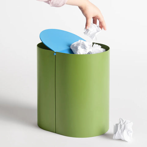 Blu Dot Binwell Wastebasket in Grasshopper green with blue swing-top lid open showing interior