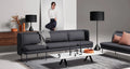 Blu Dot Bloke 95" Sofa in charcoal fabric with black steel legs styled in a moody modern living room