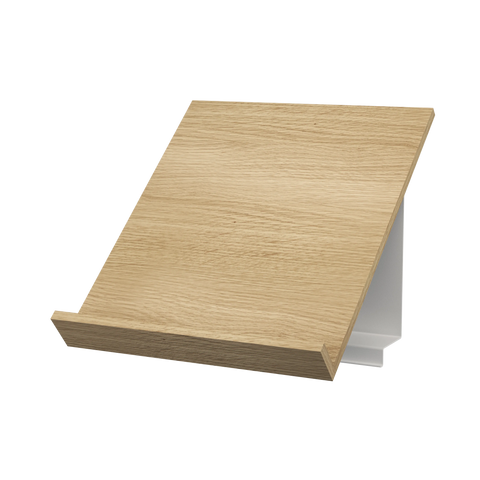 String Furniture Pira Magazine Shelf in white oak with a white bracket, wood magazine display shelf, white background packshot