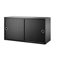 String Furniture cabinet with sliding doors in black stained ash – timeless Scandinavian cabinet design