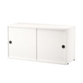 String Furniture cabinet with sliding doors in white – sleek Scandinavian modular cabinet