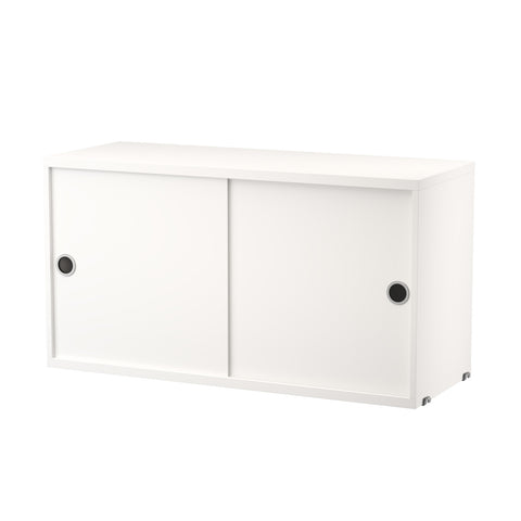 String Furniture cabinet with sliding doors in white – sleek Scandinavian modular cabinet
