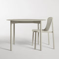 Comeuppance Round Dining Table by Blu Dot in Putty, styled with Decade Chair in Putty