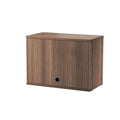 String® System cabinet with flip door in walnut veneer, modular shelving component