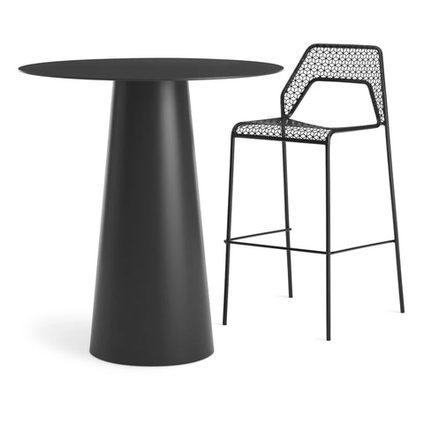 Circula Bar Height Table by Blu Dot in Oblivion, styled with Hot Mesh stools
