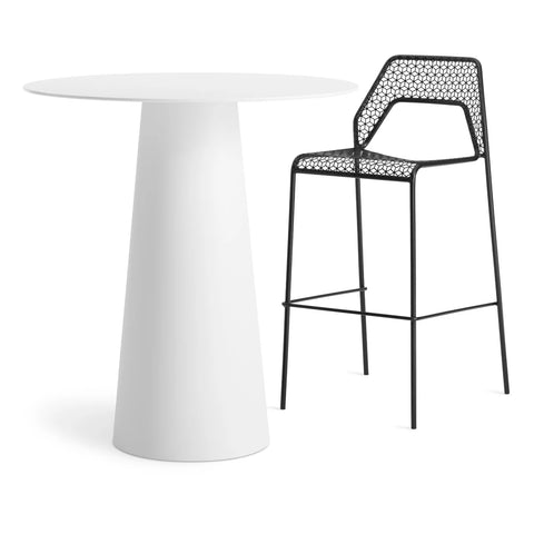 Circula Bar Height Table by Blu Dot in White, styled with Hot Mesh stools