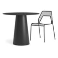 Circula 36" Dining Table by Blu Dot in Oblivion, styled with Hot Mesh Chair in Black