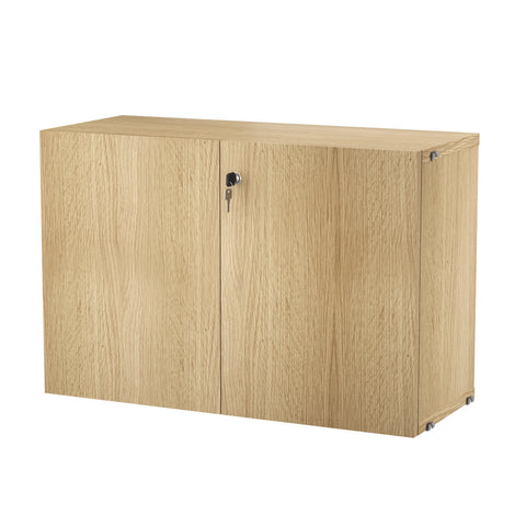 String® System cabinet with lock in natural oak finish, designed for secure and customizable shelving storage