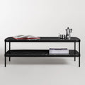 Blu Dot Comehither Coffee Table in black Marquina marble with white veining and black powder-coated steel two-tier frame, styled with open book, Aperture magazines on lower shelf, and Bialetti moka pot