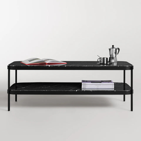 Blu Dot Comehither Coffee Table in black Marquina marble with white veining and black powder-coated steel two-tier frame, styled with open book, Aperture magazines on lower shelf, and Bialetti moka pot
