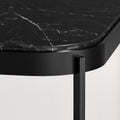 Blu Dot Comehither Side Table close-up showing rounded corner detail of black Marquina marble top with white veining and powder-coated black steel frame