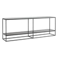 Blu Dot Construct Console in Banswara marble top and black powder-coated steel frame, shown at an angle with full-length lower shelf and slim architectural profile