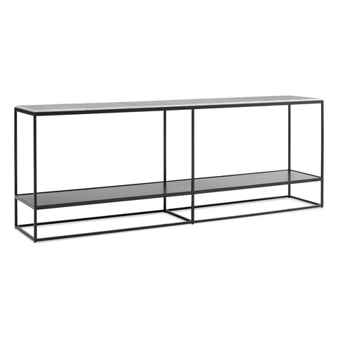Blu Dot Construct Console in Banswara marble top and black powder-coated steel frame, shown at an angle with full-length lower shelf and slim architectural profile