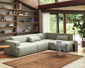 Muuto Connect Soft Modular Sofa in spacious lounge area, contemporary design with plush cushions