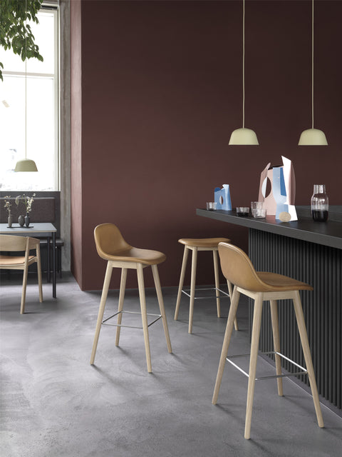 muuto fiber counter stools in a scandinavian inspired restaurant 