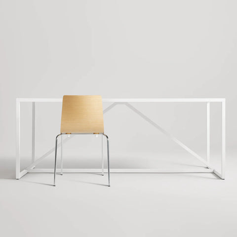 Blu Dot Chair Chair in Technical White Oak rear view styled with a white Strut dining table on white background