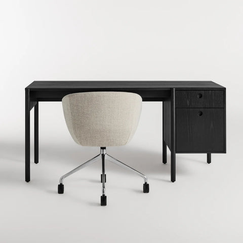 Blu Dot Cursive Desk in black on ash rear view showing round cutout drawer pulls with Host task chair on white background