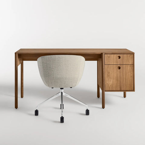 Blu Dot Cursive Desk in walnut rear view showing round cutout drawer pulls with Host task chair on white background