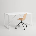 Blu Dot Clean Cut Task Chair in white oak veneer with black powder-coated aluminum five-star caster base, styled beside a white steel frame desk