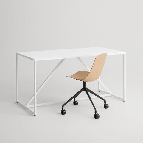 Blu Dot Clean Cut Task Chair in white oak veneer with black powder-coated aluminum five-star caster base, styled beside a white steel frame desk