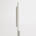 Blu Dot Cowl Floor Lamp in putty finish, close-up detail of one of the two independently pivoting shades on the slender powder-coated aluminum stalk