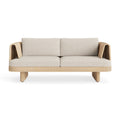 Loophole Outdoor 2 Seat Sofa by Blu Dot in all-weather rattan with Sunbrella Stucco cushions, front view