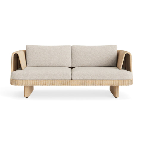 Loophole Outdoor 2 Seat Sofa by Blu Dot in all-weather rattan with Sunbrella Stucco cushions, front view