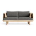 Loophole Outdoor 2 Seat Sofa by Blu Dot in all-weather rattan with Toohey Charcoal Sunbrella cushions, front view