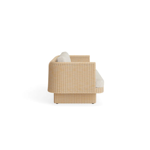 Loophole Outdoor 3 Seat Sofa by Blu Dot in Sunbrella Stucco, side view showing rattan frame profile