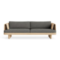Loophole Outdoor 3 Seat Sofa by Blu Dot in all-weather rattan with Toohey Charcoal Sunbrella cushions, front view