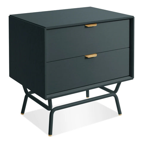 Blu Dot Dang 2 Drawer Nightstand in navy green painted oak veneer with matching powder-coated steel legs and antique brass drawer pulls, shown at an angle