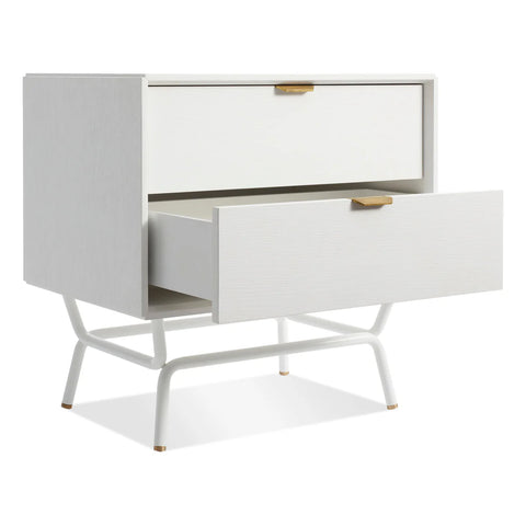 Blu Dot Dang 2 Drawer Nightstand in white painted oak veneer with white powder-coated steel legs and antique brass pulls, shown with bottom soft-close drawer open