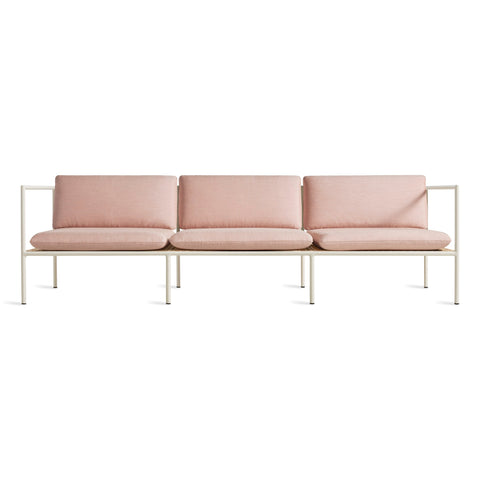 Dog Days Outdoor 3 Seat Sofa by Blu Dot, aluminum frame and all-weather rattan in Sunbrella Blush / White, front view